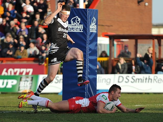 Hull KR's Greg Eden scores his team's sixth try against Widnes Vikings on February 17, 2013