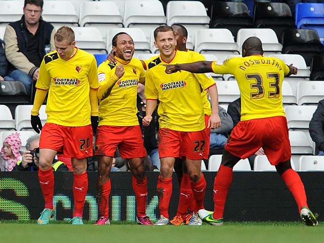 Watford's Ikechi Anya is congratulated by team mates after scoring his team's second against Birmingham on February 16, 2013