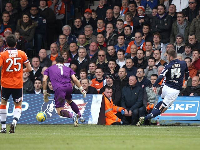 Millwall's James Henry scores the opening goal in the FA Cup 5th round tie against Luton on February 16, 2013