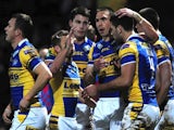 Leeds Rhinos' Joel Moon is congratulated by teammates after a try against Salford City Reds on February 15, 2013