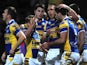 Leeds Rhinos' Joel Moon is congratulated by teammates after a try against Salford City Reds on February 15, 2013