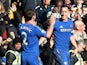 Chelsea's John Terry is congratulated by Branislav Ivanovic after scoring his team's fourth in the FA Cup 4th round replay against Brentford on February 17, 2013