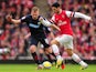 Arsenal's Mikel Arteta and Blackburn's Jordan Rhodes battle for the ball during the FA Cup fifth round tie on February 16, 2013
