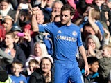Chelsea's Juan Mata celebrates scoring the opener in the FA Cup 4th round replay against Brentford on February 17, 2013