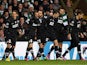 Juventus' Claudio Marchisio is congratulated by team mates after scoring the opening goal against Celtic on February 12, 2013