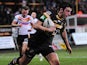 Castleford Tigers' Kirk Dixon runs clear to score a try against Bradford Bulls on February 16, 2013