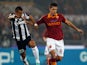 Roma's Lamela and Juventus' Arturo Vidal battle for the ball on February 16, 2013