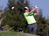 Luke Donald plays a shot during the Northern Trust Open on February 14, 2013