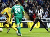 Papiss Cisse scores a goal which is ruled out during the Europa League against Metalist Kharkiv on February 14, 2013