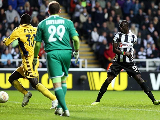 Papiss Cisse scores a goal which is ruled out during the Europa League against Metalist Kharkiv on February 14, 2013