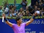 Spaniard Rafael Nadal celebrates winning the Brazil Open ATP tournament after defeating David Nalbandian on February 17, 2013