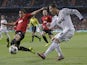 Real Madrid's Cristiano Ronaldo crosses during his team's match with Manchester United on February 13, 2013