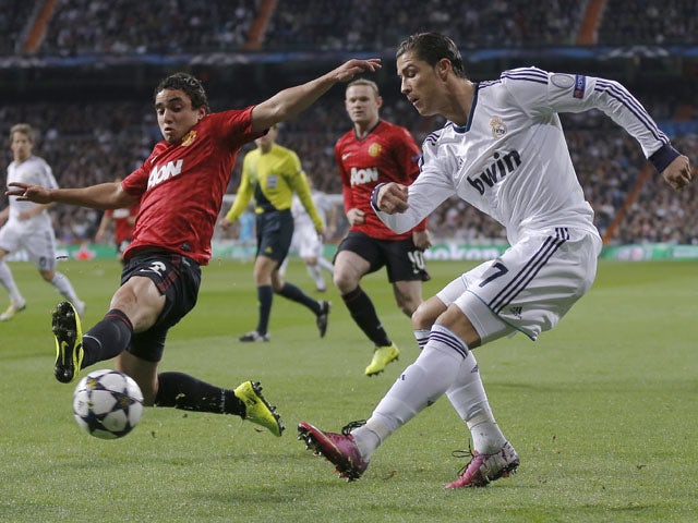 Real Madrid's Cristiano Ronaldo crosses during his team's match with Manchester United on February 13, 2013