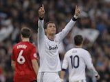 Real Madrid's Cristiano Ronaldo celebrates after scoring against Manchester United on February 13, 2013