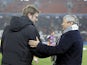 Shaktar Donetsk coach Mircea Lucescu and Dortmund coach Jurgen Klopp before their sides clash on February 13, 2013