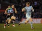 Leciester Tigers' Toby Flood runs away to score the first try of the match against Harlequins on February 16, 2013