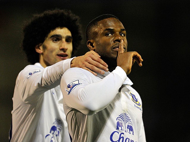 Everton's Victor Anichebe is congratulated by Marouane Fellaini after scoring the equaliser against Oldham in the FA Cup 5th round on February 16, 2013