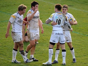 Sale Sharks' Will Cliff celebrates with team mates after scoring his team's first try against London Welsh on February 17, 2013