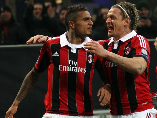 AC Milan's Kevin-Prince Boateng celebrates after scoring against Barcelona in the Champions League round of 16 tie on February 20, 2013