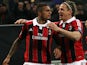 AC Milan's Kevin-Prince Boateng celebrates after scoring against Barcelona in the Champions League round of 16 tie on February 20, 2013