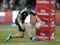 New Zealand's Ardie Savea scores a try against England on May 6, 2012