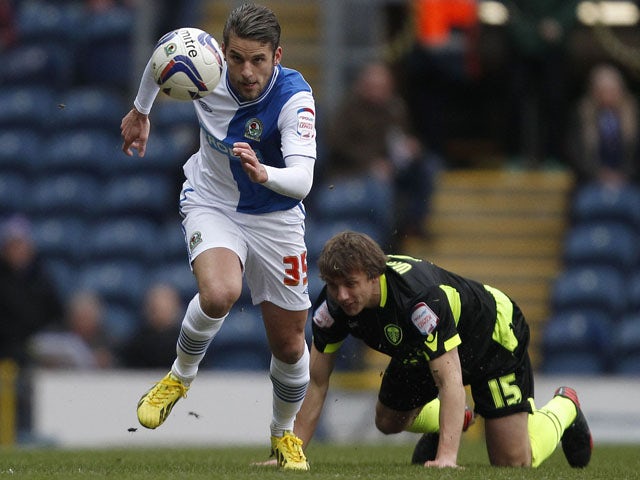Blackburn Rovers David Bentley gets away from Leeds United's Stephen Warnock during the two sides match on February 23, 2013