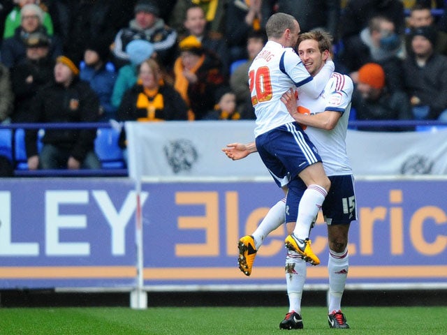 Bolton Wanderers player Craig Dawson celebrates scoring against Hull City on February 23, 2013