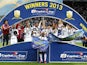 Swansea City players celebrate with the Capital One Cup trophy on February 24, 2013
