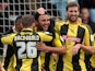 Burton Albion's Marcus Holnes celebrates with teammates after scoring against Exeter on February 23, 2013