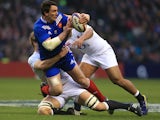 France's Louis Picamoles is tackled by two England players during the RBS Six Nations match on February 23, 2013