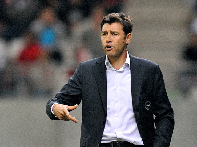 Reims coach Hubert Fournier on the touchline on September 20, 2011