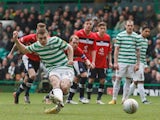 Celtic's James Forrest scores a penalty against Dundee on February 24, 2013