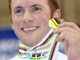 Jason Kenny celebrates with his gold medal in the Keirin during the UCI Track Cycling World Championships on February 22, 2013