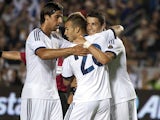 Real Madrid's Jese Rodriguez celebrates with teammates after scoring against the Los Angeles Galaxy in a friendly match on August 2, 2012