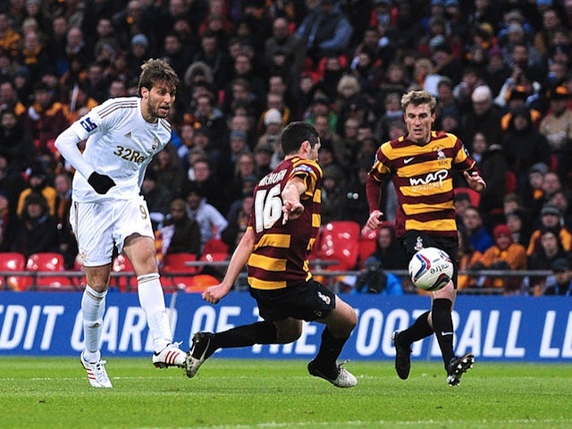 Swansea striker Michu scores the second goal against Bradford on February 24, 2013