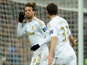 Michu proud of first medal