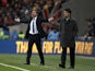 Managers Phil Parkinson and Michael Laudrup on the touchline during the Capital One Cup final between Bradford and Swansea on February 24, 2013