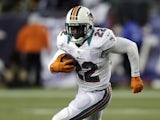 Dolphins RB Reggie Bush in action against New England on December 30, 2012