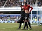United's Robin Van Persie leaves the field, after being injured in the game with QPR on February 23, 2013