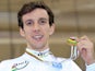 Simon Yates celebrates his gold medal in the points race during the UCI Track Cycling World Championships on February 22, 2013