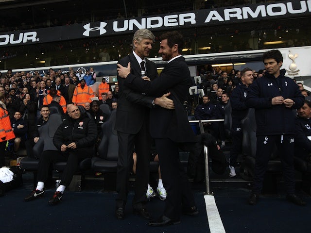 Opposing managers Arsene Wenger and Andre Villas-Boas shake hands before the North London Derby on March 3, 2013