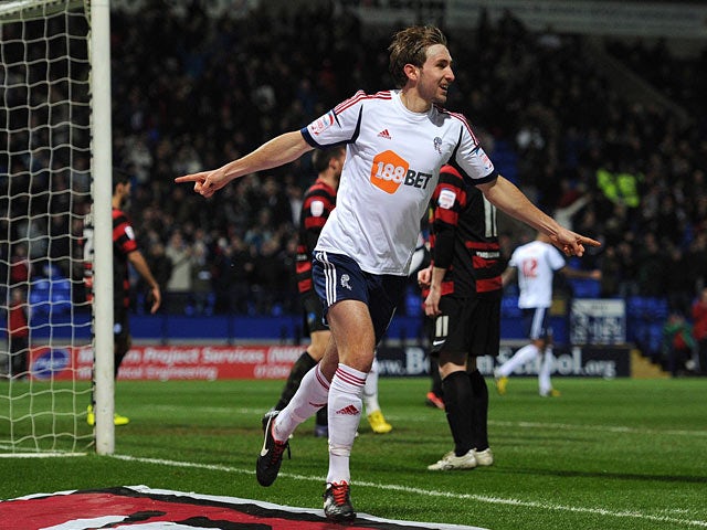 Craig Dawson celebrates scoring the opening goal against Peterborough on February 26, 2013