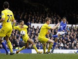 Everton's Steven Pienaar scores his side's second goal against Reading on March 2, 2013