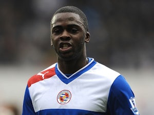 Reading's Hope Akpan in action against Wigan on February 23, 2013