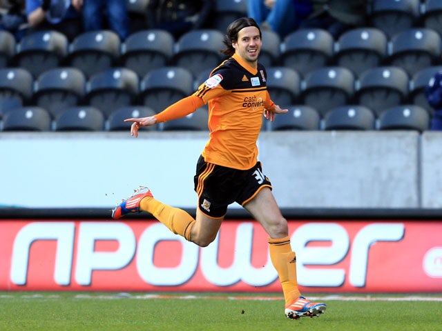 Hull City's George Boyd celebrates scoring in the first minute of his side's match with Birmingham on March 2, 2013