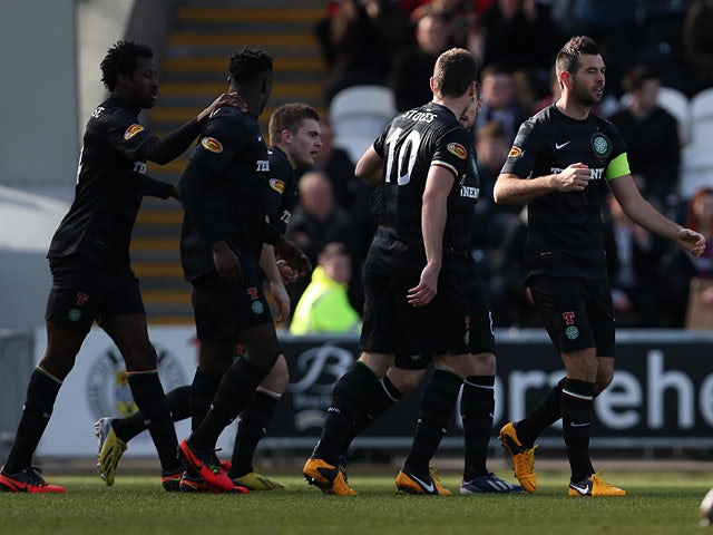 Celtic's Joe Ledley is congratulated by team mates after scoring the opener in the Scottish Cup quarter final against St Mirren on March 2, 2013