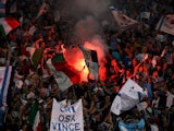 Lazio's fans let off a flare before the game against Real Madrid on October 3, 2007