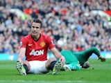 Manchester United's Robin van Persie reacts after missing a chance against Norwich on March 2, 2013