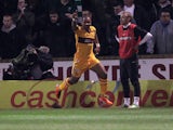 Motherwell's Chris Humphrey celebrates scoring against Celtic on February 27, 2013