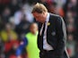 QPR manager Harry Redknapp looks dejected on the sidelines during his side's match against QPR on March 2, 2013